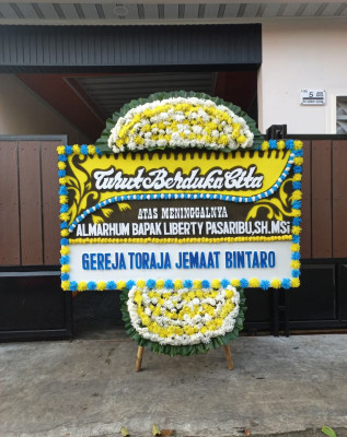 Papan Bunga Duka di Beoga Timur